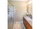 Bathroom highlighting granite countertops, a large mirror, and a glass shower at 3416 Harrison Rd, Atlanta, GA 30344