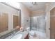 Well-lit bathroom with granite countertop, sink, toilet and shower, offering style and functionality at 3416 Harrison Rd, Atlanta, GA 30344