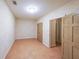 Neutral bedroom with laminate wood floors, two closets and access to another room at 3416 Harrison Rd, Atlanta, GA 30344