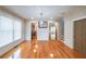 Elegant dining area featuring hardwood floors, large windows and access to the kitchen at 3416 Harrison Rd, Atlanta, GA 30344