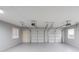 Spacious garage with three bays and light gray paint at 3416 Harrison Rd, Atlanta, GA 30344