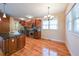 Gourmet kitchen with stainless steel appliances, granite countertops and dark wood cabinets at 3416 Harrison Rd, Atlanta, GA 30344