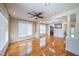 Bright living room boasts hardwood floors, recessed lighting and classic pillars at 3416 Harrison Rd, Atlanta, GA 30344