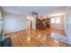 Spacious living room with hardwood floors seamlessly connecting to the kitchen and dining area at 3416 Harrison Rd, Atlanta, GA 30344