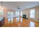 Bright living room with hardwood floors, fireplace and French doors leading to outdoor area at 3416 Harrison Rd, Atlanta, GA 30344