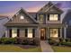Charming two-story home with manicured landscaping and craftsman-style architecture, showing great curb appeal at 1580 Johnson Nw Rd, Atlanta, GA 30318