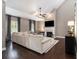 Bright living room with fireplace, large windows, hardwood floors, and comfortable seating arrangement at 1580 Johnson Nw Rd, Atlanta, GA 30318