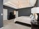 This spacious main bedroom boasts tray ceilings and plenty of room for relaxation at 1580 Johnson Nw Rd, Atlanta, GA 30318