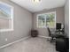 Well-lit office featuring plush carpeting, ample natural light from two windows, and neutral walls at 1580 Johnson Nw Rd, Atlanta, GA 30318