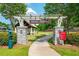 Entrance to Heman E. Perry Park featuring stone pillars and a walkway leading to a gazebo at 1580 Johnson Nw Rd, Atlanta, GA 30318