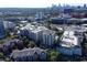 Stunning aerial perspective of the community with easy access to the city skyline and the area's green spaces at 211 Colonial Homes Nw Dr # 2203, Atlanta, GA 30309