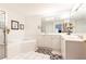 Bright bathroom with garden tub, walk-in shower and double vanity at 211 Colonial Homes Nw Dr # 2203, Atlanta, GA 30309
