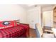 Bedroom with hardwood floors, closet, twin bed, and neutral wall color at 211 Colonial Homes Nw Dr # 2203, Atlanta, GA 30309