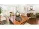 Bright dining room with fireplace view features hardwood floors, crown molding, and natural light at 211 Colonial Homes Nw Dr # 2203, Atlanta, GA 30309