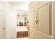 Welcoming entryway with hardwood floors leading to a spacious living area with a fireplace at 211 Colonial Homes Nw Dr # 2203, Atlanta, GA 30309