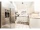 Modern kitchen featuring stainless steel appliances, granite countertops, and white cabinets at 211 Colonial Homes Nw Dr # 2203, Atlanta, GA 30309