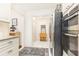Modern kitchen featuring stainless steel appliances, granite countertops, and white cabinets at 211 Colonial Homes Nw Dr # 2203, Atlanta, GA 30309