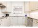 Modern kitchen featuring stainless steel appliances, granite countertops, and white cabinets at 211 Colonial Homes Nw Dr # 2203, Atlanta, GA 30309