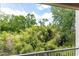 Patio view overlooking lush greenery, creating a private and serene outdoor space at 211 Colonial Homes Nw Dr # 2203, Atlanta, GA 30309
