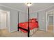 Bedroom featuring four poster bed, neutral walls, and doorways into other rooms at 2250 Edgemere Lake Cir, Marietta, GA 30062
