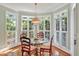 Charming breakfast nook with ample natural light, and seating for four at 2250 Edgemere Lake Cir, Marietta, GA 30062
