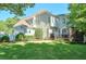 Charming home featuring a lush lawn, privacy fence, and outdoor deck at 2250 Edgemere Lake Cir, Marietta, GA 30062