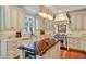 Spacious kitchen features custom cabinets, stainless steel appliances, a tiled backsplash, and a butcher block island at 2250 Edgemere Lake Cir, Marietta, GA 30062