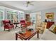 Bright living room with a bay window, plush seating, and stylish decor at 2250 Edgemere Lake Cir, Marietta, GA 30062
