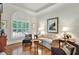 Elegant living room with refined details, tray ceilings, and lots of natural light at 2250 Edgemere Lake Cir, Marietta, GA 30062