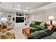 Comfortable living room featuring custom built-in shelving and recessed lighting at 2250 Edgemere Lake Cir, Marietta, GA 30062