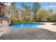 Outdoor pool area with adjacent pool house at 2250 Edgemere Lake Cir, Marietta, GA 30062