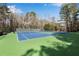 Outdoor tennis courts on a clear day at 2250 Edgemere Lake Cir, Marietta, GA 30062