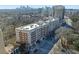 Aerial view of the building with city skyline in the background on a sunny day at 2255 Peachtree Ne Rd # 521, Atlanta, GA 30309