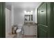 Updated bathroom featuring a single sink vanity with granite countertop, tile floors, and a shower and tub at 2255 Peachtree Ne Rd # 521, Atlanta, GA 30309