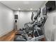 Modern exercise equipment in a well-lit gym with hardwood floors at 2255 Peachtree Ne Rd # 521, Atlanta, GA 30309