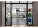 Well-equipped gym with various machines and weights, bathed in natural light at 2255 Peachtree Ne Rd # 521, Atlanta, GA 30309