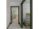 Hallway leading to a bathroom and closet, showcasing clean lines and modern design at 2255 Peachtree Ne Rd # 521, Atlanta, GA 30309