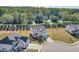 Aerial view of a new residential development, showcasing modern homes and manicured lawns at 3440 Carswell Bnd, Cumming, GA 30028
