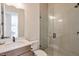 Modern bathroom features a walk-in shower with glass door, updated sink and vanity at 3440 Carswell Bnd, Cumming, GA 30028