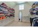 Spacious walk-in closet with ample shelving and storage space at 3440 Carswell Bnd, Cumming, GA 30028
