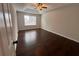 Spacious bedroom featuring a ceiling fan and hardwood floors offers comfort and style at 1015 Crest Ridge Sw Pl, Marietta, GA 30060