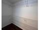 Walk-in closet featuring metal shelving for optimal storage and organization at 1015 Crest Ridge Sw Pl, Marietta, GA 30060