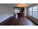 Spacious dining room with hardwood floors adjacent to the kitchen at 1015 Crest Ridge Sw Pl, Marietta, GA 30060