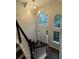 Bright foyer with tall ceilings, large windows, and modern lighting fixture at 1015 Crest Ridge Sw Pl, Marietta, GA 30060