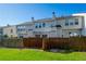 Exterior backyard view with privacy fence and well-maintained lawn at 1240 Kilmington Ct, Alpharetta, GA 30009