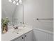 Well-lit bathroom with vanity and decor and a view of the shower and toilet at 1240 Kilmington Ct, Alpharetta, GA 30009