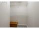Walk-in closet with white shelving and gray carpet at 1240 Kilmington Ct, Alpharetta, GA 30009