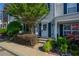 Inviting townhome with fresh landscaping, decorative shutters, and a neatly maintained entryway at 1240 Kilmington Ct, Alpharetta, GA 30009