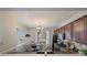 Open kitchen and dining area filled with natural light featuring a large window and updated appliances at 1240 Kilmington Ct, Alpharetta, GA 30009