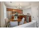 Charming kitchen featuring stainless steel appliances, wooden cabinets, and adjacent breakfast nook at 1240 Kilmington Ct, Alpharetta, GA 30009